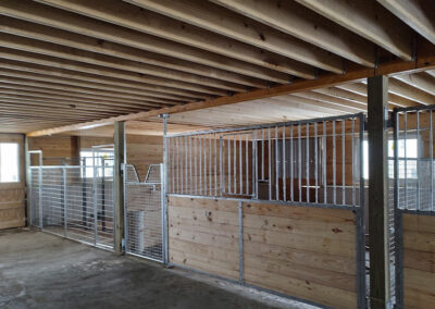 Horse Gates inside a wood barn