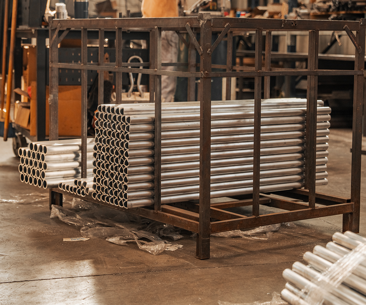 Steel tubing staged in workshop showing the benefits of hot-dip galvanizing for corrosion resistance